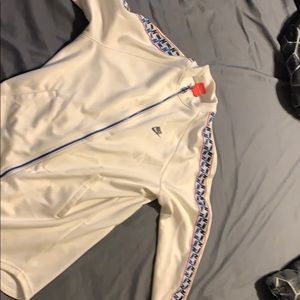 Nike jacket. White red and blue